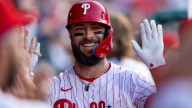 Turner's 2-run single with 2 outs in 10th inning leads Phillies past Braves 3