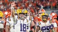LOOK: LSU equipment truck breaks gate, fire erupts on videoboard as mishaps add salt to Clemson's Week 1 wound