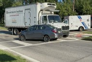VIDEO: Truck, car collide on Youngstown's West Side, one hospitalized