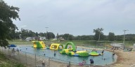 From empty pool to inflatable playground: Blanchardville opens new swim pond