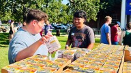UMHB students pack meals, write notes for Belton ISD students at Love CTX event