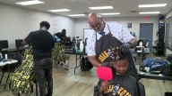 Free haircuts given to kids at apartment complex where explosion happened