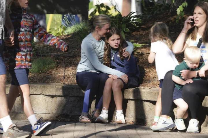 Minneapolis police: shooting at Catholic school has left 3 dead, including shooter, and 17 injured