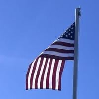 Bridge Academy students learn about the American flag at inaugural flag raising