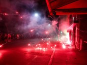 Photos: Protesters clash with police, torch Serbia’s ruling party offices