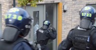 Footage shows cops ram doors as seven arrested in serious and organised crime crackdown