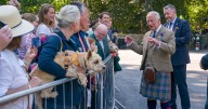 King Charles kicks off Balmoral summer residency with military ceremony as fans flock from Europe to greet him