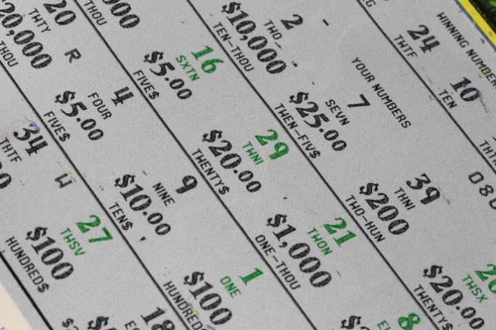 Man nabs $500K lottery prize buying groceries