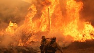 A wildfire is tearing through the mountains north of LA, with thousands under evacuation orders