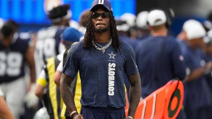 CeeDee Lamb hit by ref on sideline, drawing penalty flag