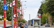 Asylum seekers in UK hotels up 8% as people draw England flags on roundabouts