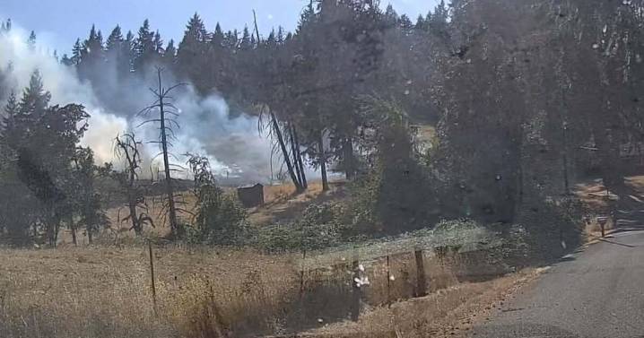 Evacuations downgraded as wildfire south of Eugene is now fully contained