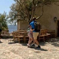 Three die in Greece as gales stoke fires, disrupt ferries