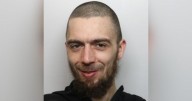 Hunt for wanted man with own nickname tattooed on his arm