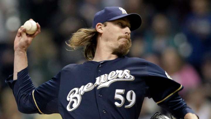 Even on his special day, John Axford tips his cap to Bob…