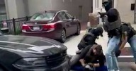 Video shows masked law enforcement arresting man in Washington, D.C.