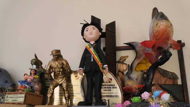 Blocked from Bolivia's election, ex-leader Morales not sure how to respond to threats of arrest