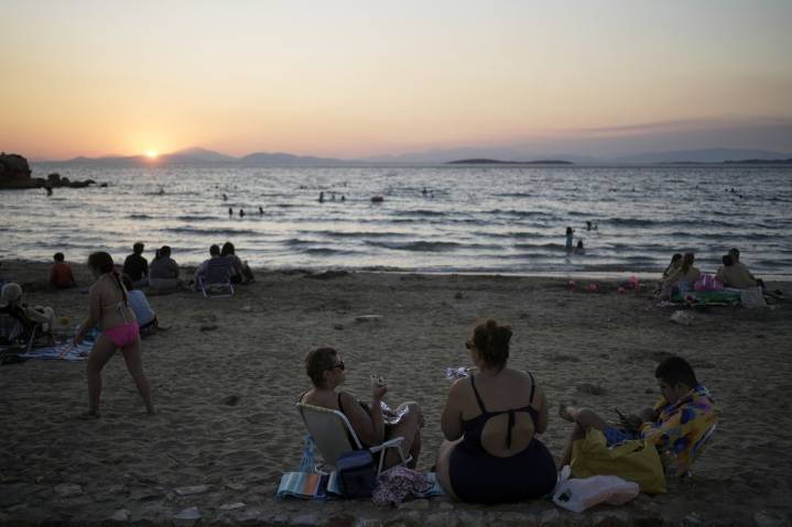 Beach on a budget: Greeks settle for day trips, priced out of iconic destinations