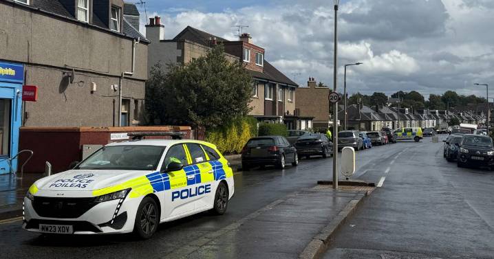 Edinburgh police remain at scene 12 hours after street locked down in 'disturbance'