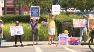 Dozens attend “Fight the Trump Takeover” rally in Otay Ranch