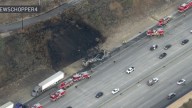 Fiery big rig crash on the 5 Freeway in Mission Hills causes traffic backup