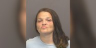 Evansville woman arrested after she punched young child in the face several times, officials say