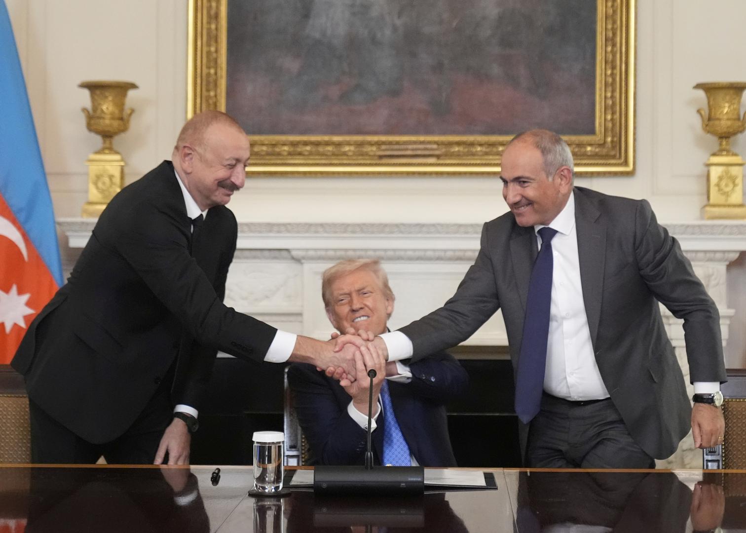 Leaders of Armenia and Azerbaijan shake hands as they join Trump, sign agreement at peace summit