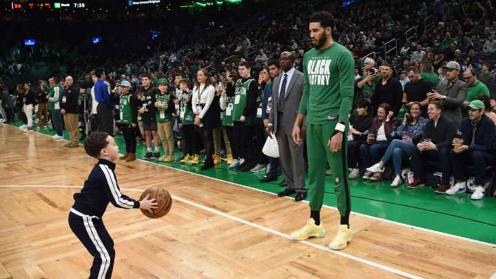 Celtics star Jayson Tatum hilariously pushes Deuce off boat during vacation