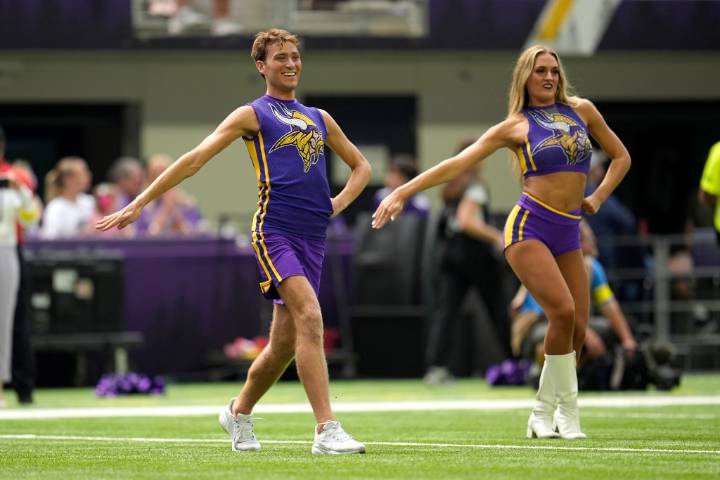 Did cheerleading originate in Minnesota as a male activity?
