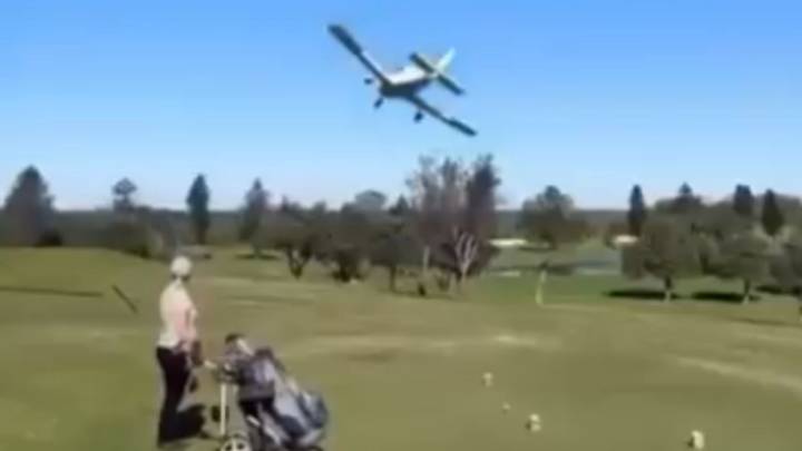 Horror moment plane CRASHES on golf course injuring two as golfers rush to help pilot instructor & student on board