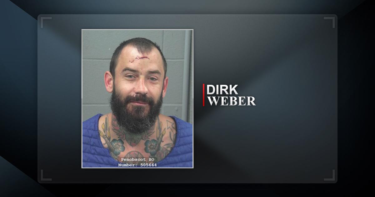 Man arrested after allegedly punching dog and dog's owner