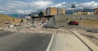 I-15 semi rollover spills trash all over Orem on