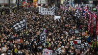 Hong Kong police warrants are an 'act of transnational repression'