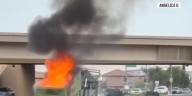 CAUGHT ON CAMERA: Dumpster on back of truck catches fire in Las Vegas