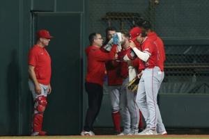 Angels Ward carted off after colliding with scoreboard