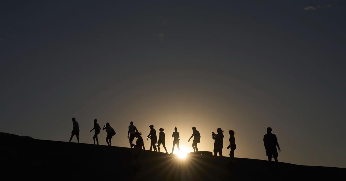 Searing heat draws visitors to California's Death Valley, where it's tough to communicate the risks