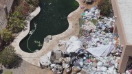 Couple plagued by awful smell after neighbor's body decomposes in backyard