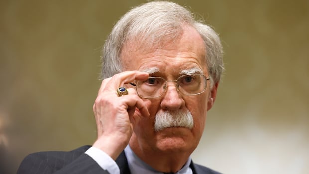 John Bolton, former Trump official critical of president, has home searched