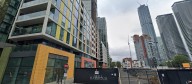 Woman in her 20s plunges to death from building in Canary Wharf