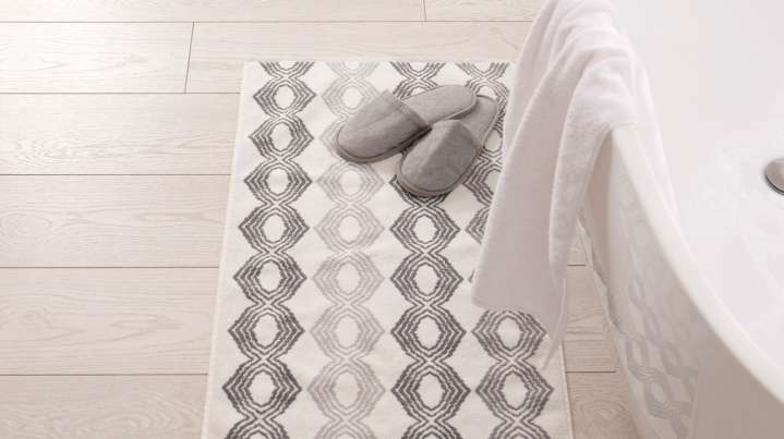 The Laundry Room Staple That Makes Cleaning Bathroom Rugs A Breeze
