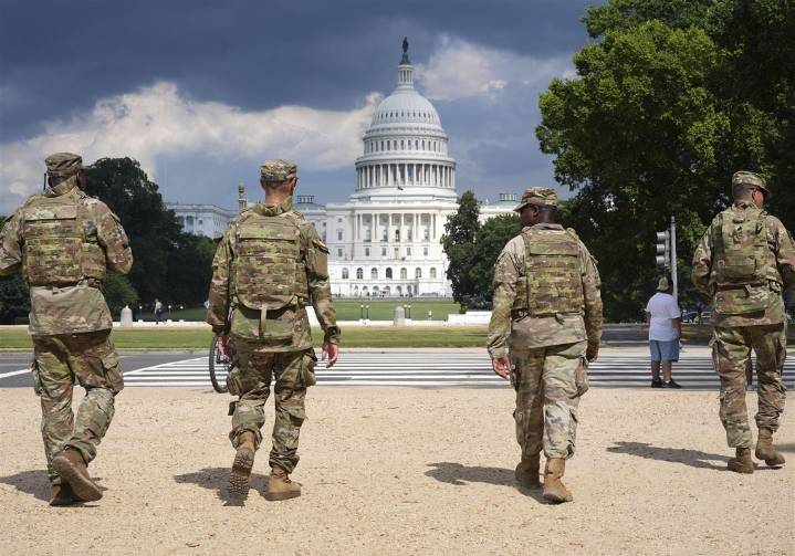 National Guard vehicle collides with civilian car near U.S. Capitol, trapping one person