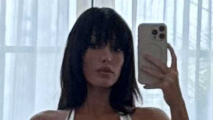 Bianca Censori reveals jaw-dropping cleavage in just a plunging silver bodysuit for mirror selfie