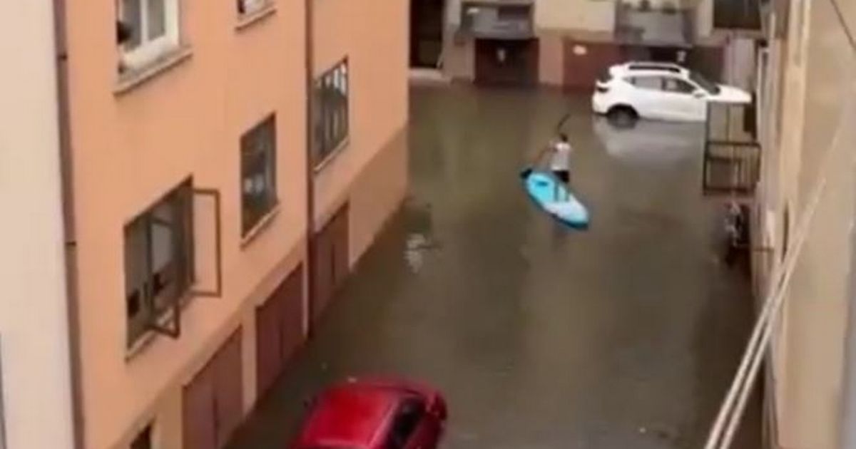 Holiday hotspot hit with floods as streets turn to rivers and man swept to death