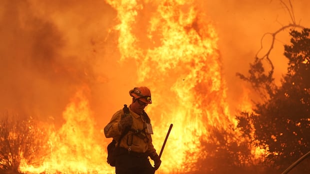 Thousands under evacuation order as wildfire spreads north of L.A.