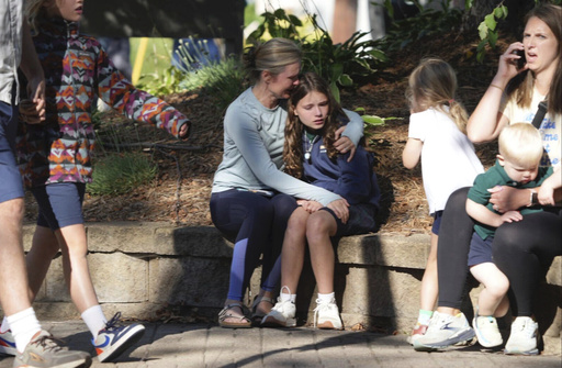 The Latest: Shooting at a Minneapolis school leaves 3 dead, including the shooter, and 17 injured