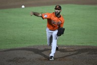 Willie MacIver hits a 2-run double in the 9th to rally Athletics over Orioles