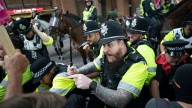 U.K. migrant protests spark angry confrontations : NPR