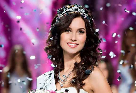 Beauty queen, 30, dies in horror crash as elk smashes through Porsche windscreen and fatally injures newly