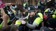 Police clash with protesters at migrant hotel rallies across the country