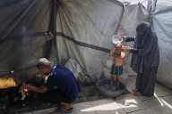 Heat and thirst drive families in Gaza to drink water that makes them sick